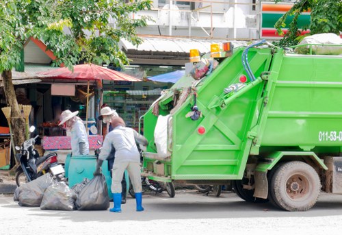 Charity donation van collecting reusable items from a house clearance